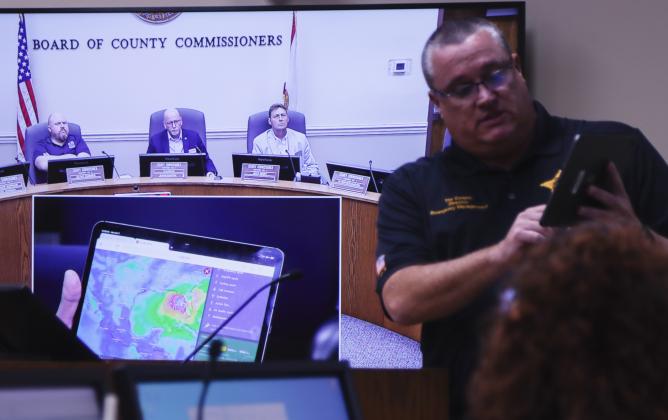 Emergency Management Director Tim Cooper shows potential radar for Hurricane Milton to the Board of County Commissioners on Monday at the emergency meeting Monday. Photo by Ashley Chandler/News-Leader