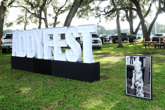 A photo of Addy greets guests of the second annual Addyfest on Monday at Central Park. Addy died last year after a long-fought battle with Philadelphia Chromosome Positive Leukemia. Photo by Ashley Chandler/News-Leader