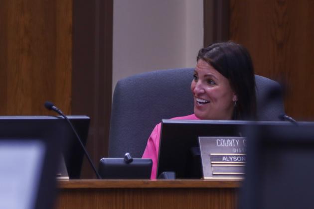 Commissioner Alyson McCullough expresses her excitement about the final two purchases in Phase 1 of the Thomas Creek Implementation Plan on Monday at the Board of County Commissioners meeting. Photo by Ashley Chandler/News-Leader