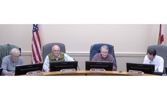 From left, Bill Korn, Leonard Wood, Bill Watson and Chris Hill, members of the Nassau County Conservation Land Acquisition Management committee, meet Nov. 21 in the Commissioners Chambers. Submitted
