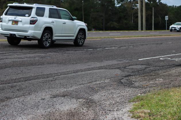 The surface of this stretch of State Road 200 shown is beyond its end of life. The resurfacing project, originally slated for Fall of 2025, is set to begin Monday, with night closures expected. Ashley Chandler/News-Leader