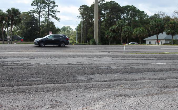 The surface of this stretch of State Road 200 shown is beyond its end of life. The resurfacing project, originally slated for Fall of 2025, is set to begin Monday, with night closures expected. Ashley Chandler/News-Leader