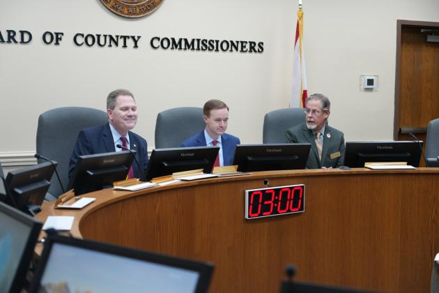 From left, Representative Dean Black, Senator Clay Yarborough and Nassau County Commissioner A.M. “Hupp” Huppmann meet on Nov. 18 in the Commissioners Chambers for the annual Nassau County Legislative Delegation meeting. Submitted photo