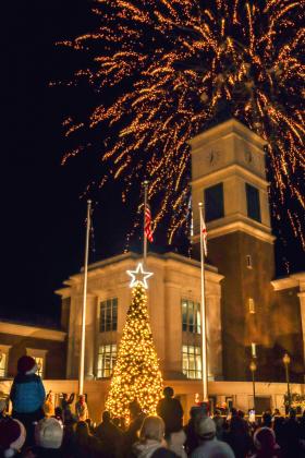 Fireworks explode behind the Robert M. Foster Justice Center as the Christmas tree is lit earlier this month at Nassau County’s annual Tree Lighting. The event was “bigger and better” in celebration of the bicentennial. Photo by Ashley Chandler/News-Leader