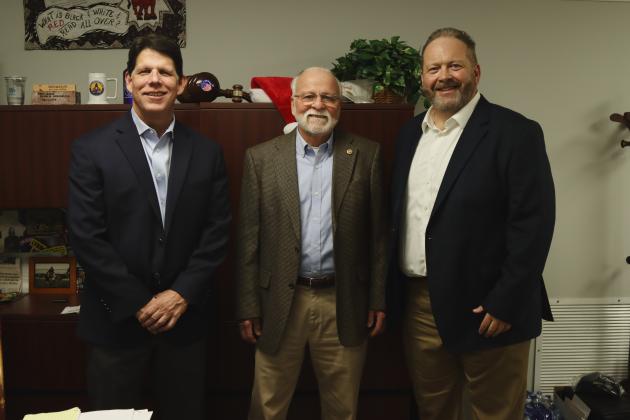 From left, CNI Newspapers President Mark Major, outgoing News-Leader Publisher Foy Maloy and newly appointed interim Publisher Todd Wilson pause for a photo during Tuesday's leader-ship transition announcement at the News-Leader newspaper. Photo by Ashley Chandler/News-Leader