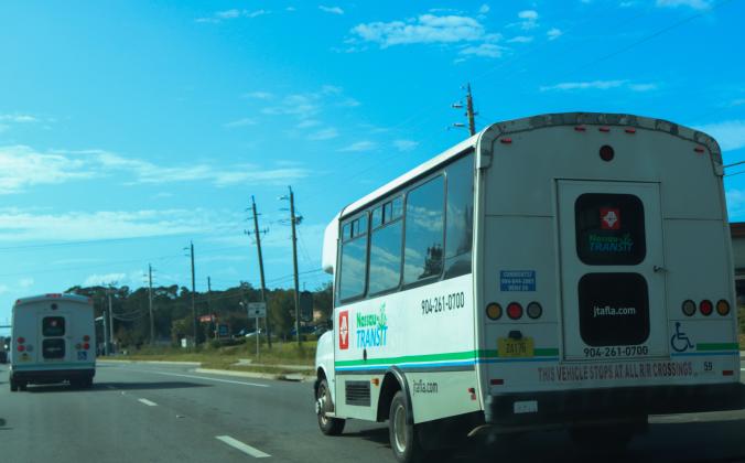 Jacksonville Transportation Authority buses travel down State Road 200 in October. JTA took over as the Nassau County Community Transit Coordinator (CTC) this year. Photo by Ashley Chandler/News-Leader