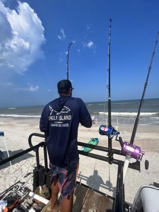 Alberto Vanegas backs his truck right down to the surf and often fights large sharks right from the back of his truck. Shark baits are carried several hundred offshore with a large drone. Submitted photo