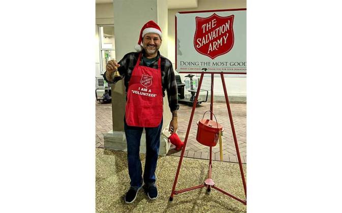 Daniel Marquez ringing bells at the Wildlight Publix. Submitted photo
