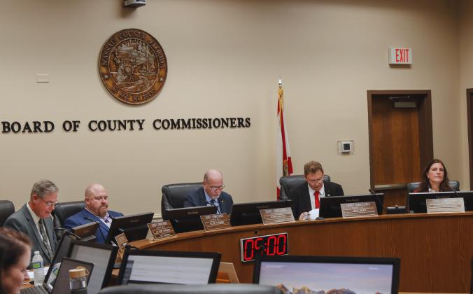 From left, commissioners A.M "Hupp" Huppmann, Klynt Farmer, John Martin, Jeff Gray and Alyson McCullough meet Monday in the Commissioners Chambers. Photo by Ashley Chandler/News-Leader