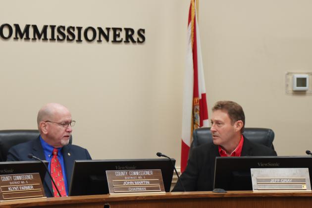 From left, commissioners John Martin and Jeff Gray during the Dec. 18 Board of County Commissioners meeting. Photo by Ashley Chandler/News-Leader