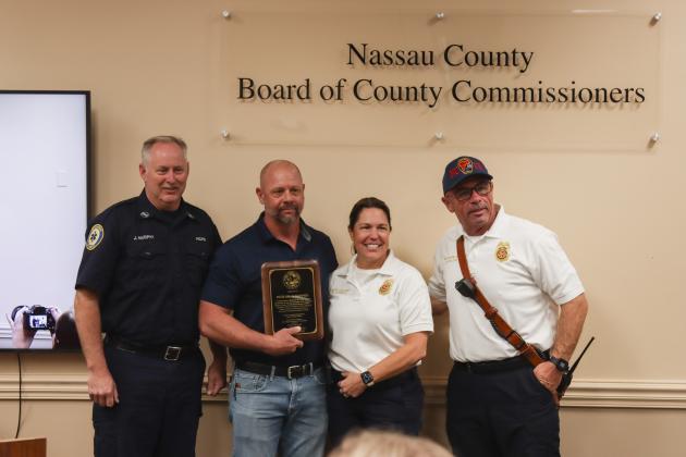 Peter Gunnel is retiring after 31 years with Fire Rescue. On Dec. 18 he was recognized at the Board of County Commissioners meeting. Photo by Ashley Chandler/News-Leader