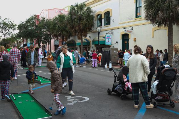 Putt-putt was one of the many activities at the Black Friday Pajama Party in Downtown Fernandina Beach. Photo by Ashley Chandler/News-Leader