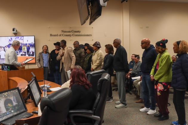 Commissioner A.M. "Hupp" Huppmann and the Board of County Commissioner presented a proclamation to American Beach residents on Jan. 13 declaring Jan. 31 as American Beach Day and recognizing the historic district's 90th anniversary. Photo by Ashley Chandler/News-Leader