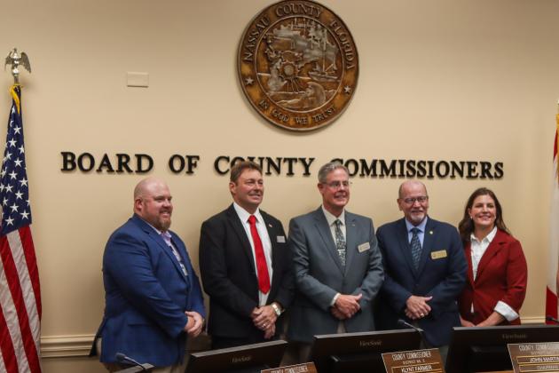 From left, commissioners Klynt Farmer, Jeff Gray, A.M. "Hupp" Huppmann, John Martin and Alyson McCullough pose for a photo Dec. 9 following the BOCC's annual reorganizational meeting. News-Leader