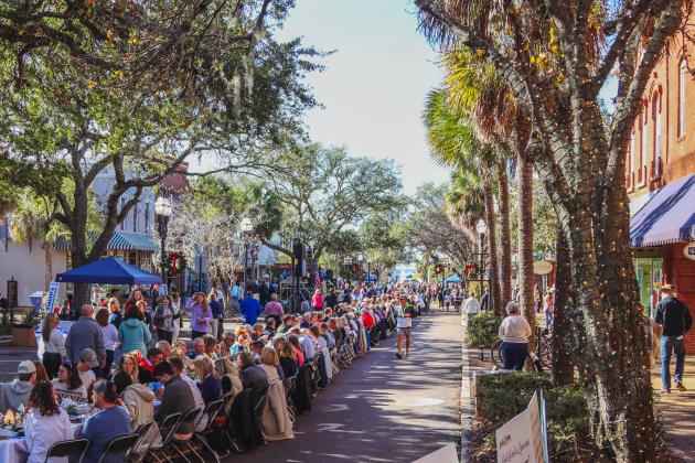 Dining Down Centre was jam-packed Wednesday with guests who sat down together at the longest table ever on Centre Street. Photo by Ashley Chandler/News-Leader