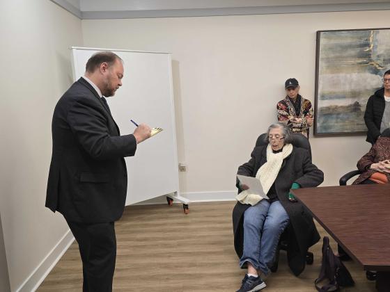 Aaron Bean representative Bryan Campbell told John Cipriano that if she had issues receiving her Social Security benefits, due to begin soon, to contact his office in Fernandina Beach.Photo by Julia Roberts/News-Leader