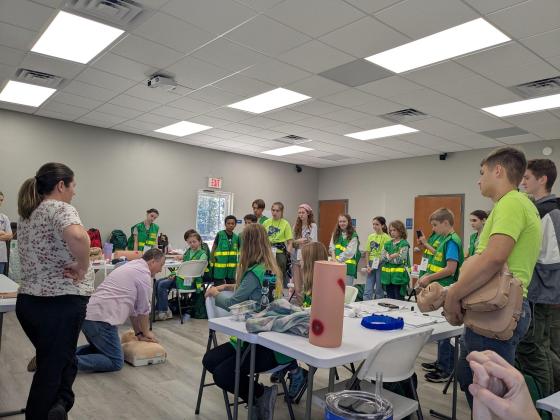 Guest speaker Jim Bollenbacher, second from left, covered several important first aid and emergency skills with the YETies on Saturday during a 4-H YET program course. Photo by Nassau County 4-H