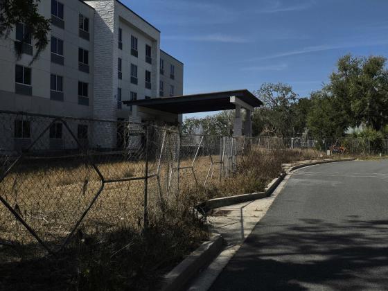 This site, just over the Shave Bridge on Amelia Island, has been found in violation of the codes of Fernandina Beach; the owner has been put on notice by Code Enforcement to clean it up or pay fines. Photo by Julia Roberts/News-Leader