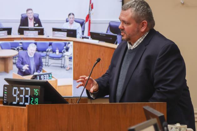 Deputy County Manager Robert Companion talks about the Nassau Crossing Park Splash Pad on Wednesday at the Board of County Commissioners meeting. The board approved an amendment to a contract with ACON Construction Co. to cover the rest of the cost of design and construction of the Splash Pad, expected to be completed by summer. Photo by Ashley Chandler/News-Leader