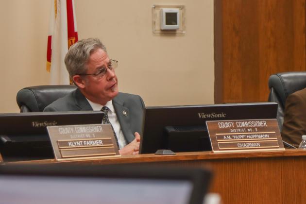 Chairman of the Board of County Commissioners A.M. "Hupp" Huppmann speaks Tuesday at the Board of County Commissioners joint meeting with the Nassau County School District. Photo by Ashley Chandler/News-Leader