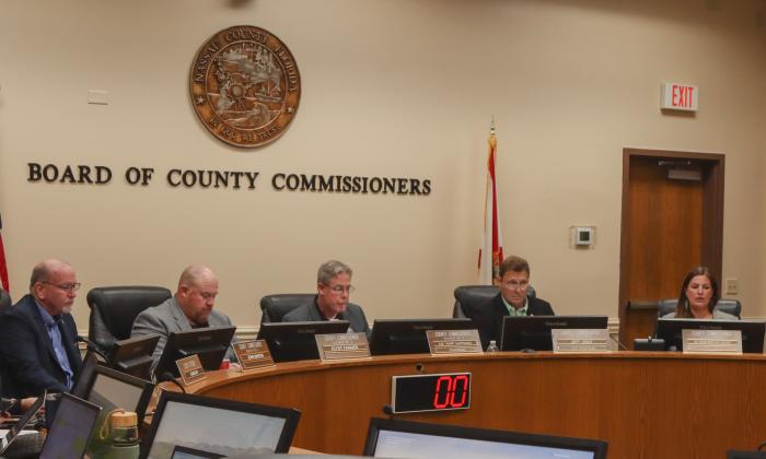 County commissioners meet Feb. 10 for the Board of County Commissioner meeting in the James S. Page Governmental Complex. From left, John Martin, Klynt Farmer, A.M. “Hupp” Huppmann, Jeff Gray and Alyson McCullough. Photo by Ashley Chandler/News-Leader