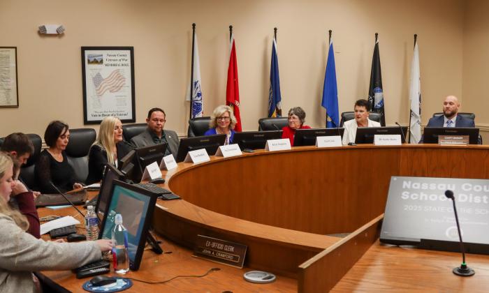 On Tuesday the Board of County Commissioners held a joint session with the Nassau County School District. From left, District board members Brett Steger, Shannon Hogue, Lissa Braddock, Joe Zimmerman, Kristi Simpkins, Gail Cook, Superintendent Dr. Kathy Burns, County Manager Taco Pope. Photo by Ashley Chandler/News-Leader