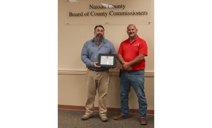 From left, David White and Facilities Manager Tony Lombardi. White was recognized at the Feb. 19 Board of County Commissioners meeting as the county's Employee of the Quarter. Photo by Ashley Chandler/News-Leader