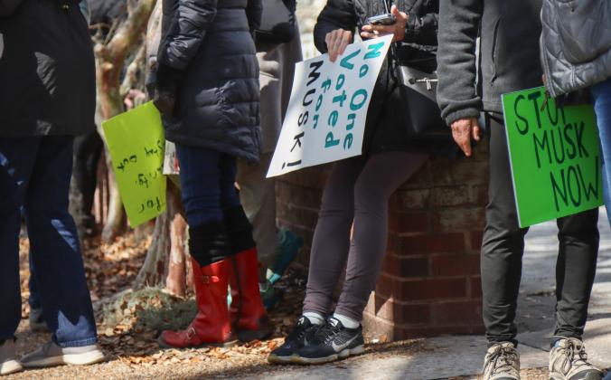 Protesters were Downtown on Thursday to voice their opinion on DOGE, Social Security and Elon Musk to Congressman Aaron Bean and his staff. Photos by Ashley Chandler/News-Leader