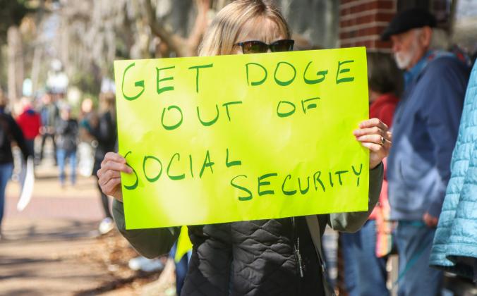 Protesters were Downtown on Thursday to voice their opinion on DOGE, Social Security and Elon Musk to Congressman Aaron Bean and his staff. Photos by Ashley Chandler/News-Leader