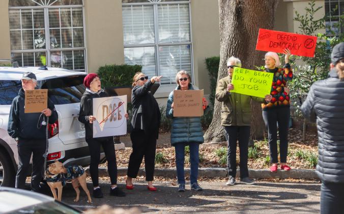Protesters were Downtown on Thursday to voice their opinion on DOGE, Social Security and Elon Musk to Congressman Aaron Bean and his staff. Photos by Ashley Chandler/News-Leader