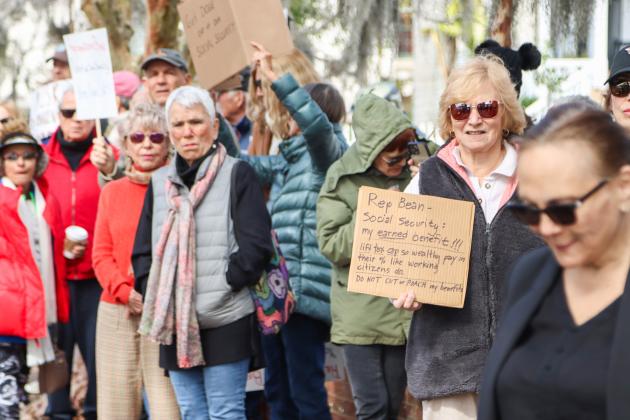 Protesters were Downtown on Thursday to voice their opinion on DOGE, Social Security and Elon Musk to Congressman Aaron Bean and his staff. Photos by Ashley Chandler/News-Leader