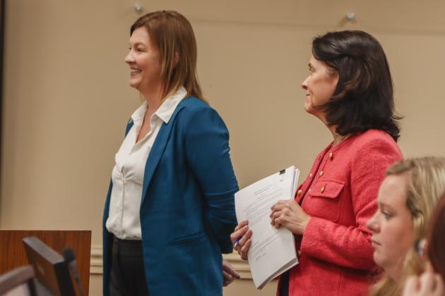 From left, Brandy Carvalho, acting executive director for Imagine Nassau (Nassau County director of strategic advancement); and Deputy County Attorney Abigail Jorandby in December at a Board of County Commissioners meeting.. Photo by Ashley Chandler/News-Leader