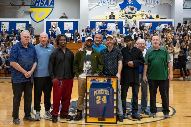 Vic Garvin (father of the late Patrick Garvin, a member of the team who wore No. 24), coach Jon Anderson, players Tai Alford and Terin Dallas, coach Shane Talbert, players Jake Brogdon and Carlos Holcey, team scorekeeper Jim Corbett and head coach Matt Schreiber. Photo by Penny Glackin/Special for the News-Leader