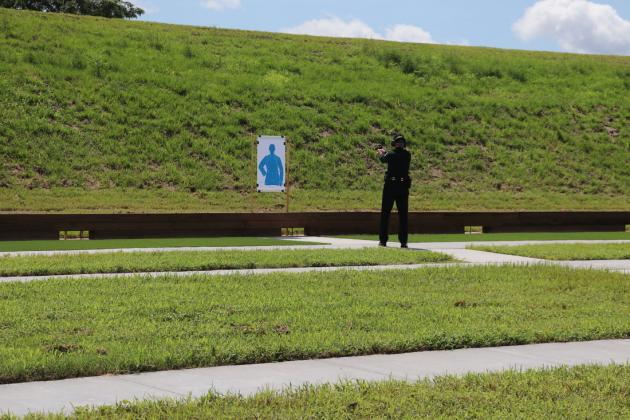 Sheriff Bill Leeper fires the ceremonial first shots at the South Range of the Nassau County Public Safety Training Complex at the Ribbon Cutting event held in 2022 for Phase One of the regional training complex. Submitted photo