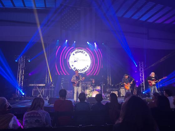 A.M. “Hupp” Huppmann performs with The Honey Badgers at Saturday night’s HangarPalooza event, where more than 500 attendees gathered at the Fernandina Beach Airport for entertainment. Photo courtesy Karen Adkins