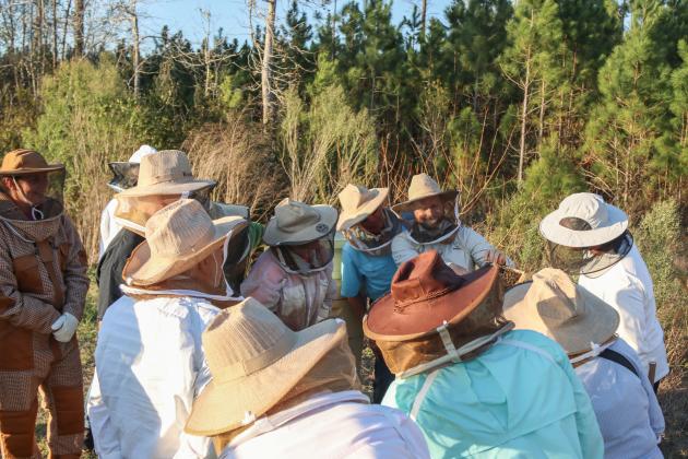 Myron Beachy, president of Nassau County Beekeepers Association, teaches members of the group about beekeeping Feb. 27 at a mentoring session held at the Northeast Florida Fairgrounds. Photo by Ashley Chandler/News-Leader