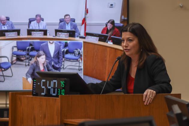 Christina Thomas, director of workforce development for NFBAA, at the March 10 Board of County Commissioners meeting. The board signed a Letter of Support for a state appropriations request that will be used to expand the apprenticeship program. Photo by Ashley Chandler/News-Leader