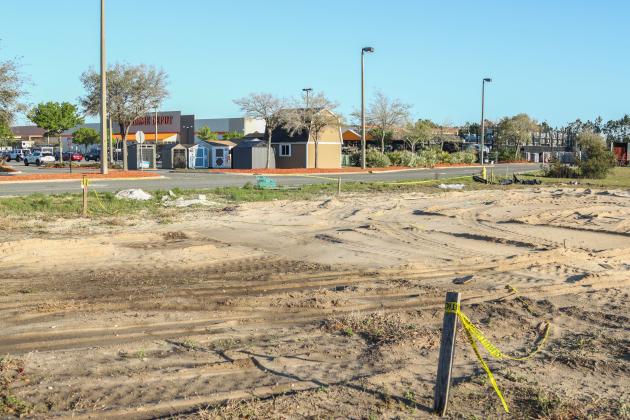 A dirt lot is shown March 11 where Nassau County’s Hwy 55 was supposed to be, located on the edge of the Home Depot Parking lot. Photo by Ashley Chandler/News-Leader
