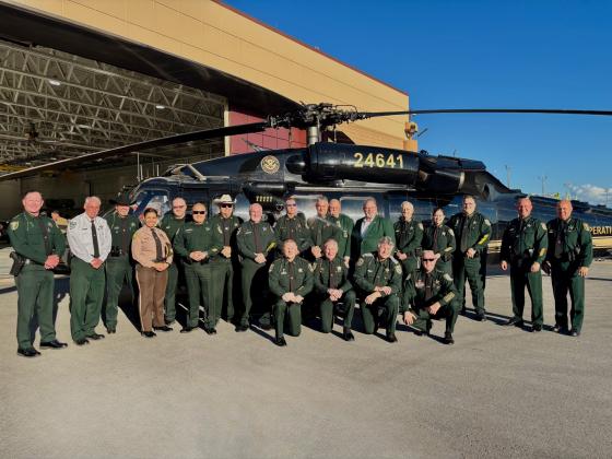 Nassau County Sheriff Bill Leeper, bottom row second from the left, joined other state law enforcement in Miami-Dade County last week for a press conference about the 287 (g) program. All 67 Florida counties have entered into agreement with ICE to assist in serving warrants for those in the United States illegally. Submitted photo
