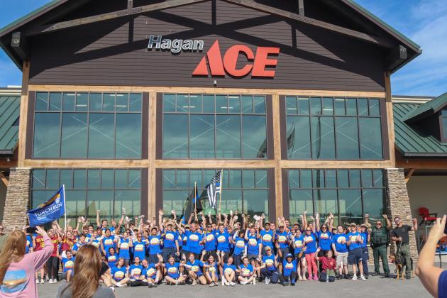 Participants in the Nassau County Sheriff's Office's Law Enforcement Torch Run posed for a photo at Hagan Ace Hardware following the completion of the 1.26-mile run. Photo by Ashley Chandler/News-Leader