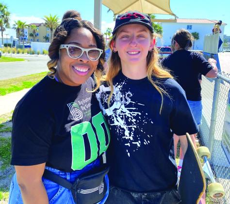 Pinson poses with Daiserae White, director of Communications &amp; Outreach with BBBSNEFL. Photo by Beth Jones/News-Leader