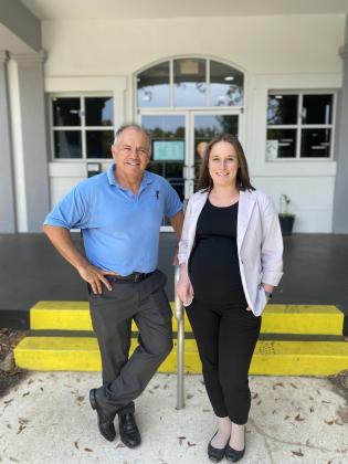 Cezar Gonzalez, who completes his 37-year YMCA career on May 16, with Melissa Yuchasz, who will lead both the McArthur and Wildlight locations serving Nassau County’s expanding population.  Photo by Tracy McCormick-Dishman/News-Leader
