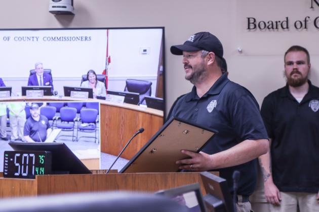 Commissioner A.M. "Hupp" Huppmann presented to Nassau County Animal Care &amp; Control staff a proclamation recognizing this week as National Animal Control Appreciation Week on Monday at the Board of County Commissioners meeting in the Commission Chambers at the James S. Page Governmental Complex. Photo by Ashley Chandler/News-Leader