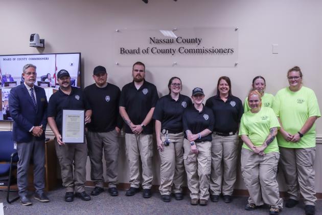 Commissioner A.M. "Hupp" Huppmann presented to Nassau County Animal Care &amp; Control staff a proclamation recognizing this week as National Animal Control Appreciation Week on Monday at the Board of County Commissioners meeting in the Commission Chambers at the James S. Page Governmental Complex. Photo by Ashley Chandler/News-Leader