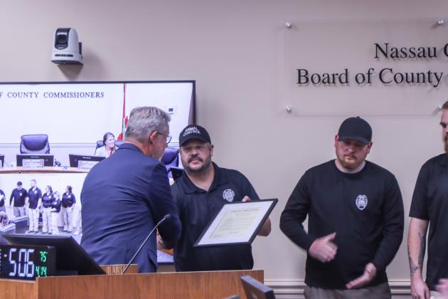 Commissioner A.M. "Hupp" Huppmann presented to Nassau County Animal Care &amp; Control staff a proclamation recognizing this week as National Animal Control Appreciation Week on Monday at the Board of County Commissioners meeting in the Commission Chambers at the James S. Page Governmental Complex. Photo by Ashley Chandler/News-Leader