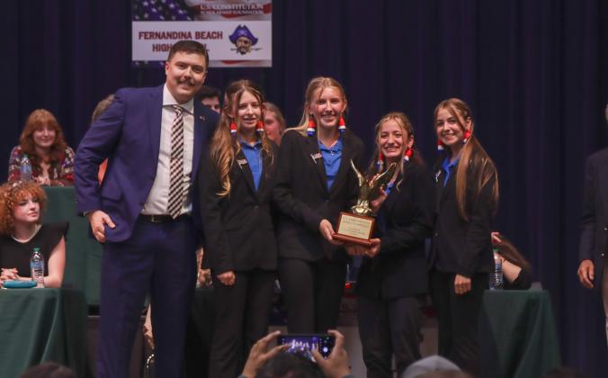 The Home Education team won the 2025 Constitution Bowl, coached by Alisa Burbo, Amelia Burbo, Amelia Hawkes, Eva Hawkes and Lauren Walters. Photo by Ashley Chandler/News-Leader