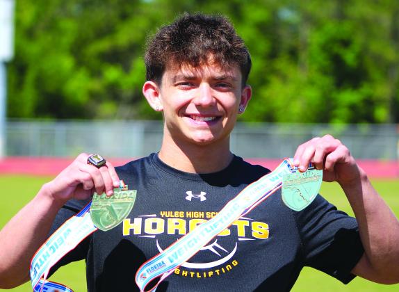 Coen Brehmer, a senior at Yulee High School, defended his title at the state weightlifting championships last week. Photo by Beth Jones/News-Leader