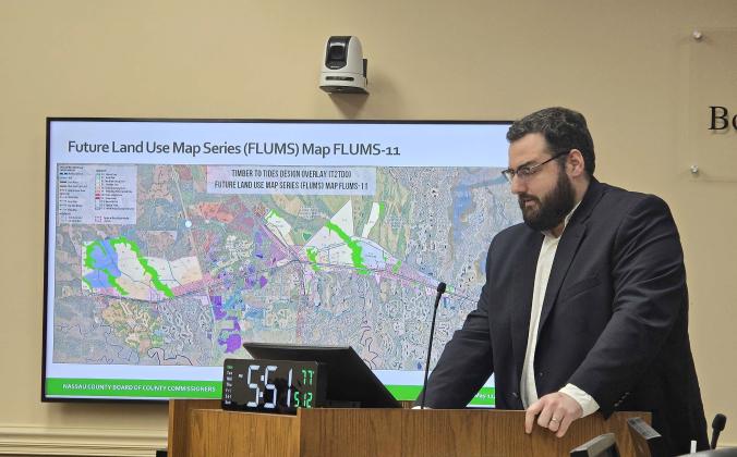 Nassau County Senior Planner/Designer Josh Macbeth speaks Monday at the Board of County Commissioners meeting. News-Leader