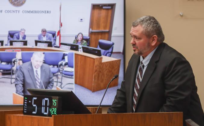 Deputy County Manager Robert Companion speaks at the April 28 Board of County Commissioners meeting in the Commissioners Chambers. Photo by Ashley Chandler/News-Leader