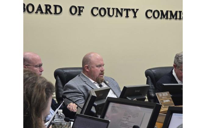Commissioner Klynt Farmer speaks Monday at the Board of County Commissioners meeting. News-Leader
